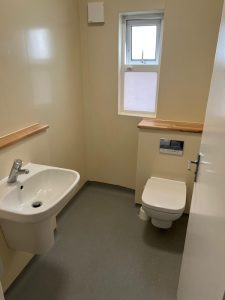 A bathroom with a sink and toilet