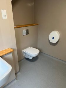 A toilet and sink in a bathroom